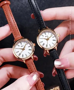 Close-up of minimalist Gedi ladies quartz watches with leather straps and Roman numerals