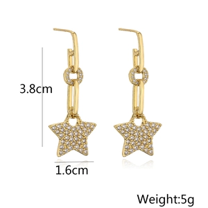 Detailed view of 18K gold plated star drop earrings with dimensions 3.8cm and 1.6cm