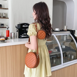 Brown quilted leather round crossbody bag set with detachable coin purse for women