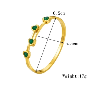 Gold-plated titanium steel oval bangle with four green heart-shaped zircon stones