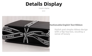 Detail of black flip jewelry gift box with a bow-tied silk ribbon and Best Wishes text