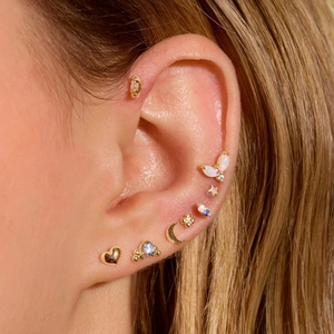 S925 silver gold studs featuring opal moon, star, and butterfly designs on ear