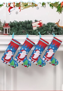 Detailed view of four blue felt Christmas stockings with Santa hanging on a fireplace mantel