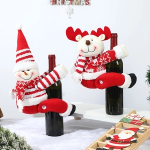 Knitted Christmas wine bottle covers with cute snowman and reindeer holiday decorations