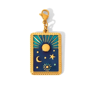 Detailed view of sun and moon tarot pendant with blue enamel and gold finish charms