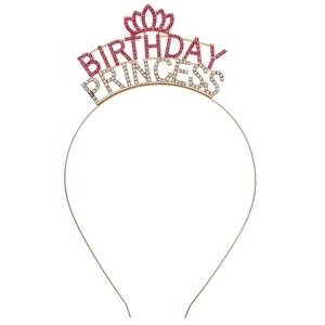 Close-up of pink and white rhinestone Birthday Princess lettering on gold metal headband