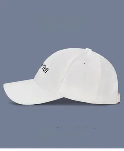 Detail view of cotton baseball cap with high-quality side letter embroidery