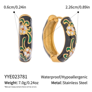 Detail view of enamel flower earrings in gold stainless steel with size measurements