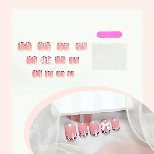 Pink leopard print press-on nails with white 3D bows and French tips, 24-piece set