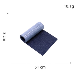 Detail showing 51x8cm dark blue denim adhesive patch for clothing repair and DIY crafts