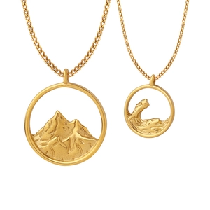 Gold-plated stainless steel necklace set featuring mountain and sea wave engraved pendants