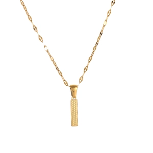 Macro detail of golden stainless steel necklace featuring a textured rectangular pendant