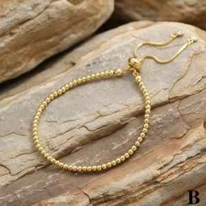 Minimalist 18K gold plated bead bracelet with adjustable bolo clasp and zircon accents