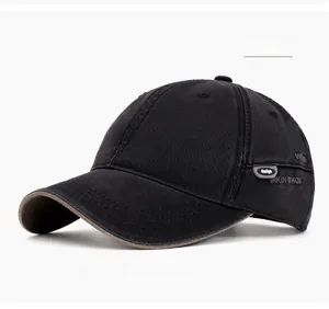 Detailed side view of black cotton baseball cap with embroidered lettering and metal logo