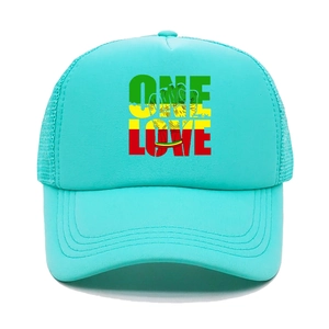 Close-up of One Love print on teal mesh trucker hat with Rasta color accents