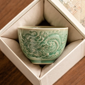 Ceramic dragon relief teacup in green glaze presented in a premium beige gift box