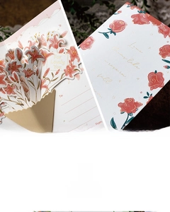 Detail of 3D pop-up lily floral greeting card with elegant gold foil stamping and laser cut