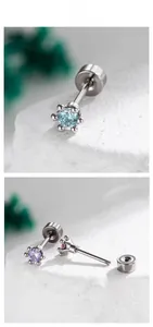 Macro detail of 4mm screw-back cartilage studs with blue, purple, and pink cubic zirconia