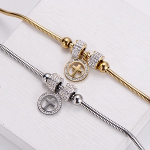 Sparkling pave cross charm snake chain bracelets in gold and silver finish set