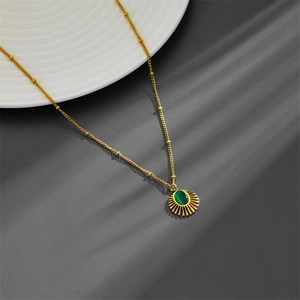 Minimalist gold stainless steel sunburst necklace with oval green natural stone pendant