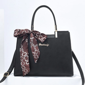 Elegant black lychee leather tote bag with printed silk scarf and gold Danbaoly logo