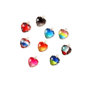 Colorful glass heart pendants with gold frames for handmade jewelry making and DIY crafts