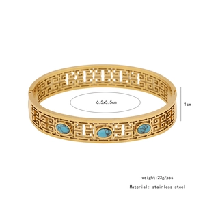 Detail showing dimensions of vintage hollowed turquoise stainless steel bangle