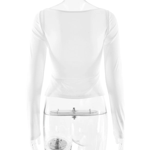 Rear view detail of white long-sleeved slim fit top with elastic fabric and wide neckline