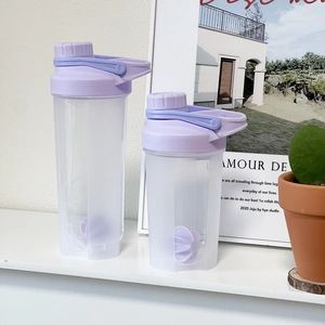 Dual set of frosted purple protein shaker bottles with clear scales and mixing balls