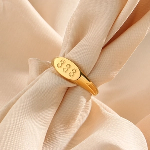 18K gold plated stainless steel ring with oval top featuring lucky 333 engraving
