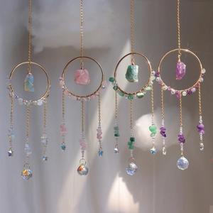 Modern rainbow suncatcher set with raw crystals and faceted glass balls on metal rings