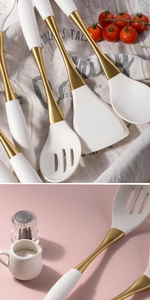 Detailed close-up of white silicone kitchen utensils with elegant gold-plated handles