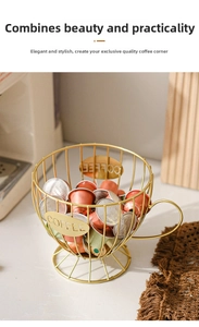 Close-up of golden cup-shaped metal wire coffee pod holder with decorative COFFEE label