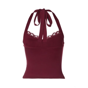 Detailed view of dark red halter top featuring intricate lace trim and tie-neck design