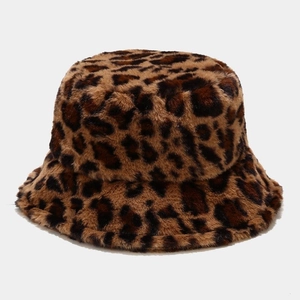 Close-up of leopard print faux fur bucket hat showing soft plush texture and thick fabric