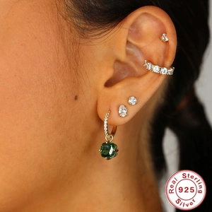 S925 sterling silver earrings set with green emerald pendant and white zircon accents