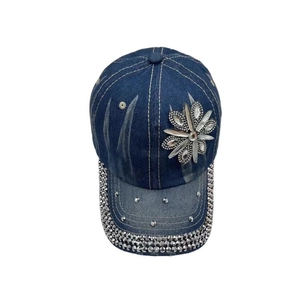 Deep blue denim baseball cap with rhinestone flower decoration and sparkling crystals
