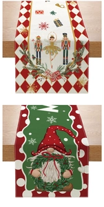 Detail of Christmas table runners featuring nutcracker and gnome motifs on wood
