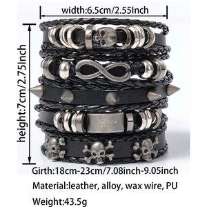 Detail of multi-layer leather bracelets with skull and infinity charms for men