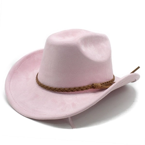 Detailed close-up of pink suede wide brim jazz hat with fringe band and western style design