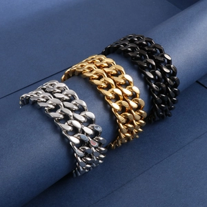 Detailed view of Cuban link bracelets in silver, gold, and black finishes on blue background