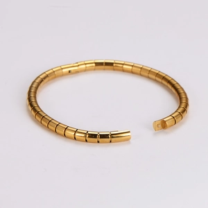 Minimalist gold bamboo style flexible snake bone bracelet with modular link structure