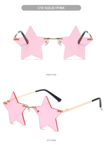 Close-up of pink star-shaped rimless sunglasses with gold metal bridge and arms