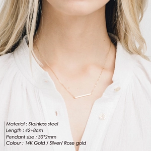 Layered gold-plated stainless steel necklace for women shown on a model neck