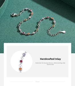 Macro detail of S925 silver bracelet featuring colorful zircon stones and lobster clasp