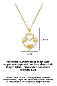 Detailed macro view of gold-plated titanium heart pendant with micro-set zircons
