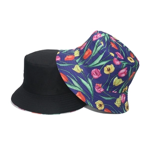 Black and navy blue floral bucket hats with tulip patterns for summer sun protection