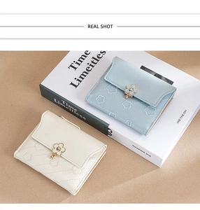 Short quilted PU leather wallets in light blue and beige with metal flower clasps