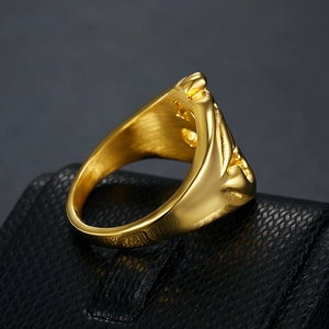 Retro punk style engraved gold stainless steel ring displayed on black leather box