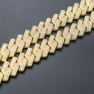 Close-up of 14mm gold-plated Cuban link chain with detailed cubic zirconia inlay settings